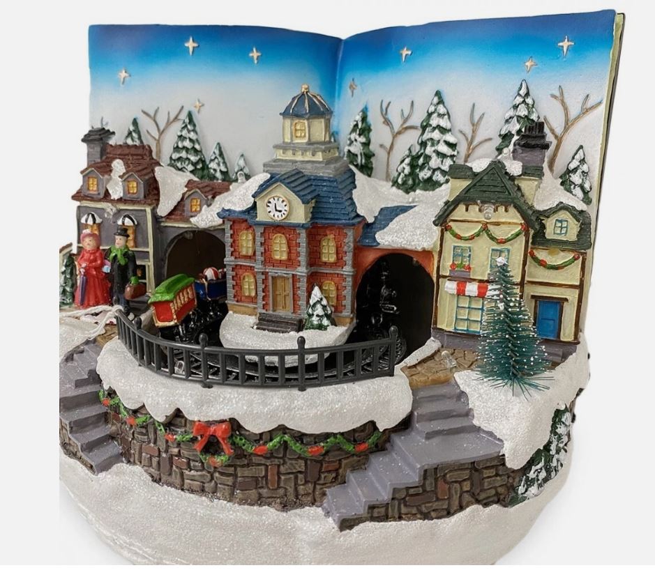 VILLAGGIO NATALIZIO LIBRO CON LUCI SUONI MOVIMENTO 23LX16PX18H CM