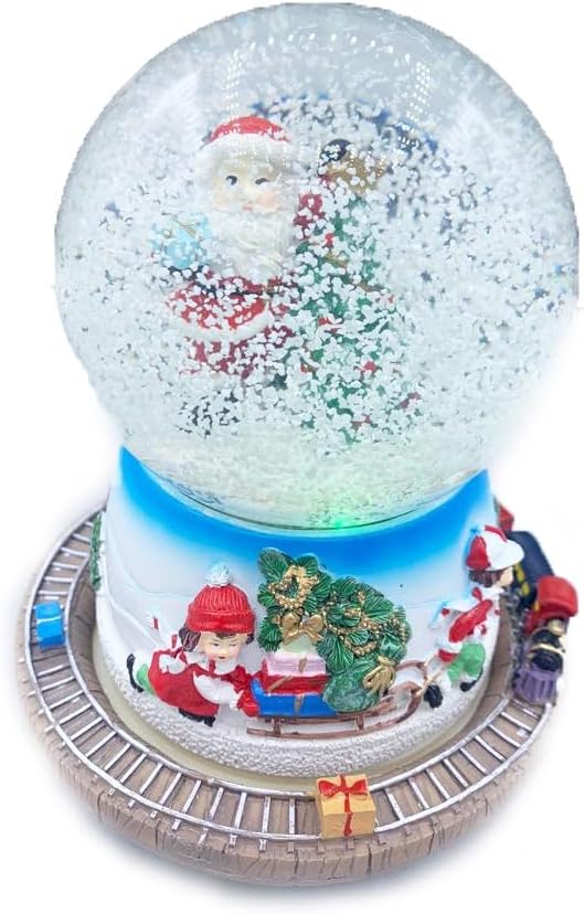 Carillon Sfera Babbo Natale di Fianco L'Albero di Natale con i Suoi Regali,Suona Una Melodia Natalizia, e la Neve riempie la Sfera e Ruota Intorno Trenino carico di Regali - 16cm