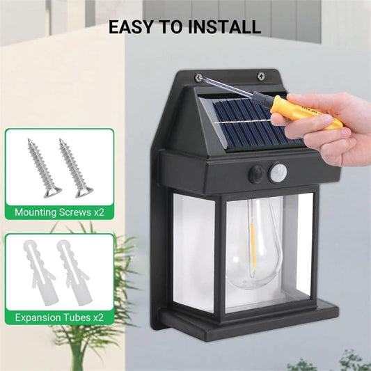 Applique Lampada da parete per esterni con lampadina filamento a led luce calda con ricarica ad energia solare crepuscolare e sensore di movimento - Varie Colorazioni