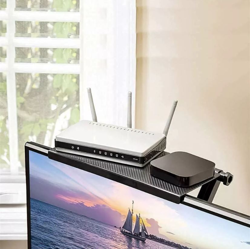 SUPPORTO TV PER UN AMBIENTE ORDINATO, RIPIANO SUPERIORE DELLO SCHERMO PIEGHEVOLE